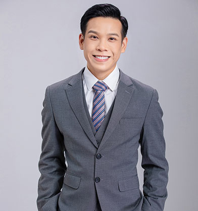 Houston Vietnamese attorney, David Nguyen, wearing a suit and tie, posing for a photo - Law Office of David Nguyen, PC.