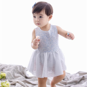 An infant girl dressed in white with blue floral accents - Law Office of David Nguyen, PC